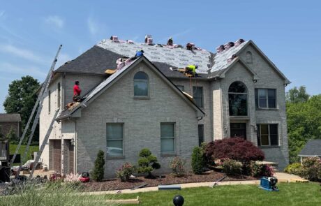 IMG_3345(1) Roofers installing new shingles on a large residential home in Pittsburgh.